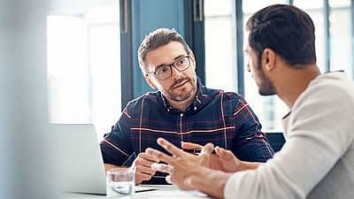 An employer being mentored by a contact person